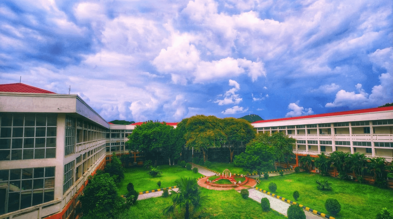 University academic buildings surrounding the landscaped campus courtyard